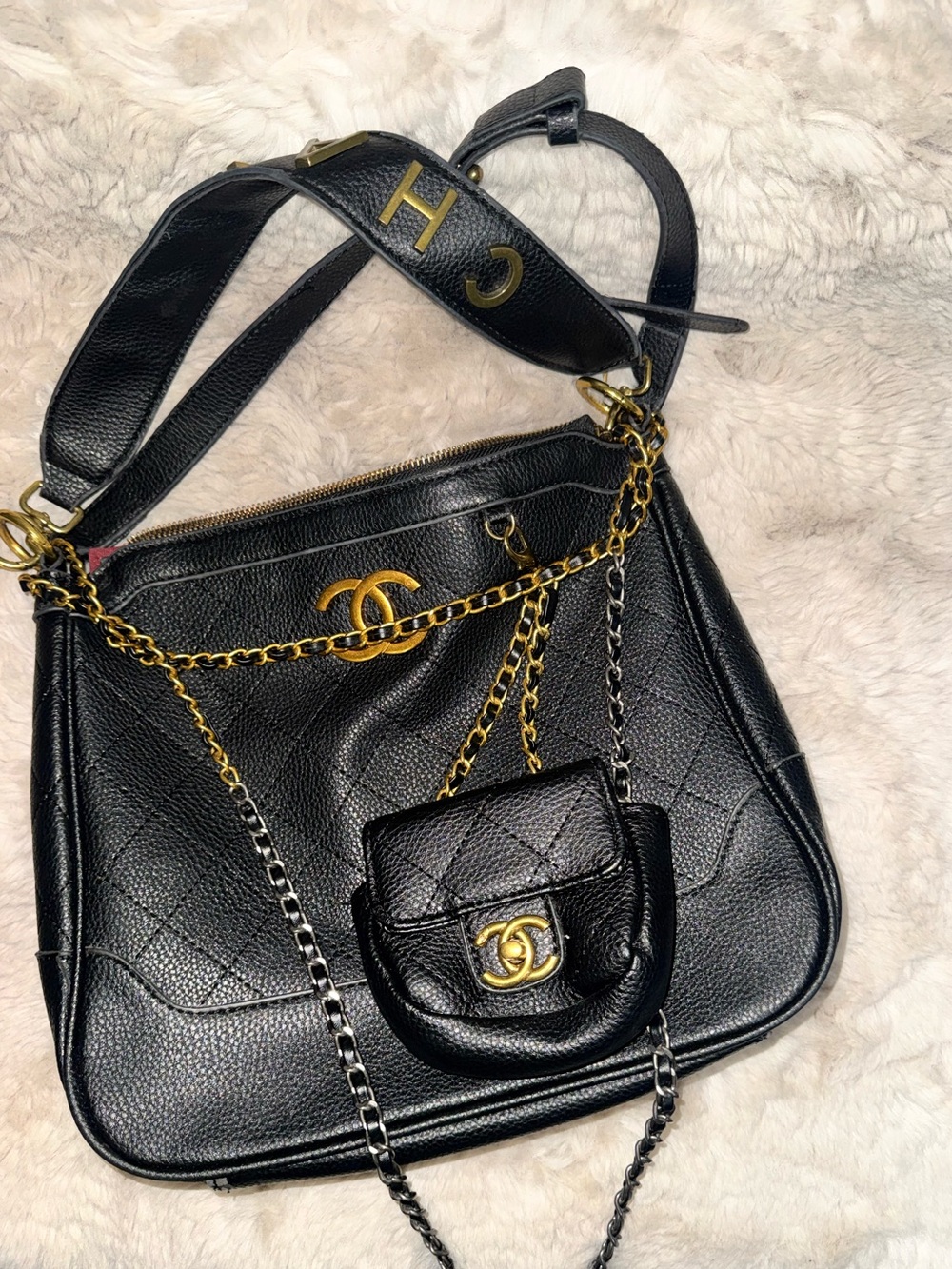 CHANEL Black Quilted Leather Shoulder Bag with Gold Hardware